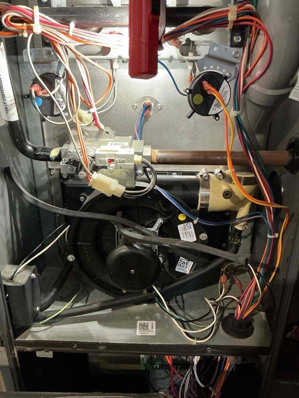 Performed scheduled NAT Heating maintenance visit. Inspection revealed significant rust and corrosion on heat exchanger tubes within the furnace. Examined electrical connections and verified proper wiring of control board, pressure switches, and blower assembly.
