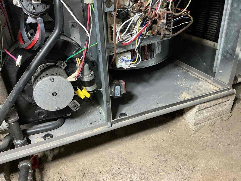 Performed comprehensive tune-up on Lennox furnace system. Inspected interior components including blower assembly, control board, and wiring connections. Verified proper operation of all mechanical elements and examined PVC ventilation piping. Customer's humidifier was activated as requested.