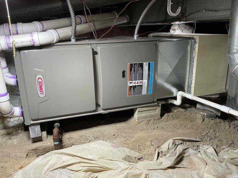Performed comprehensive tune-up on Lennox furnace system. Inspected interior components including blower assembly, control board, and wiring connections. Verified proper operation of all mechanical elements and examined PVC ventilation piping. Customer's humidifier was activated as requested.