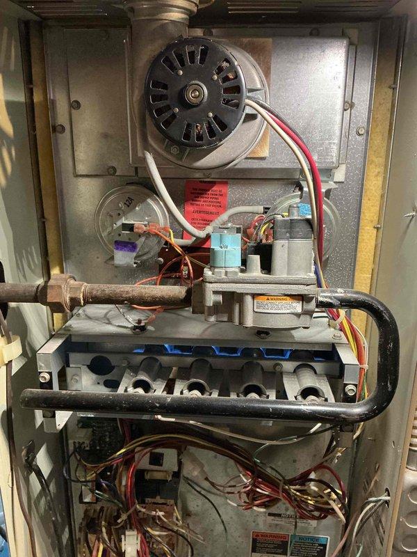 Performed scheduled heating maintenance service on residential gas furnace system. Conducted thorough inspection of unit components including blower motor, fan assembly, gas valve, and heat exchanger. System was found to be operating within normal parameters with all electrical connections secure and no visible issues detected.
