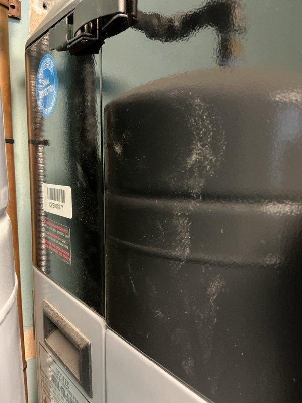 Diagnosed non-functioning tanked water heater (Weil-McLain brand) during same-day service appointment. Inspection revealed heating system with proper PVC ventilation and copper supply line connections. Performed necessary repairs to restore water heater functionality.