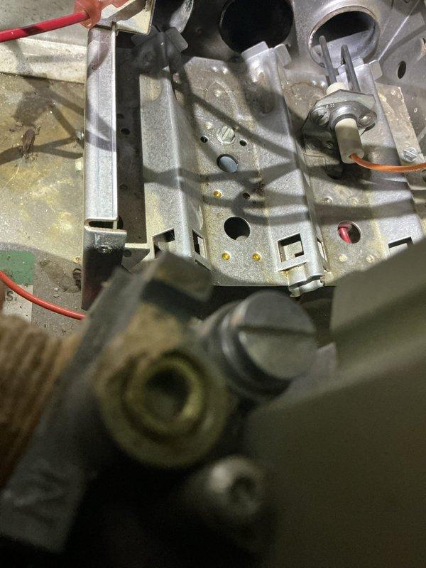 Responded to customer complaint of heating system intermittently shutting down. Diagnosed faulty wiring connection at the control board where the rainbow wire harness exhibited poor contact. Repaired loose connections, cleaned dust accumulation from control assembly, and verified proper operation through multiple test cycles. System now functioning correctly with stable operation.