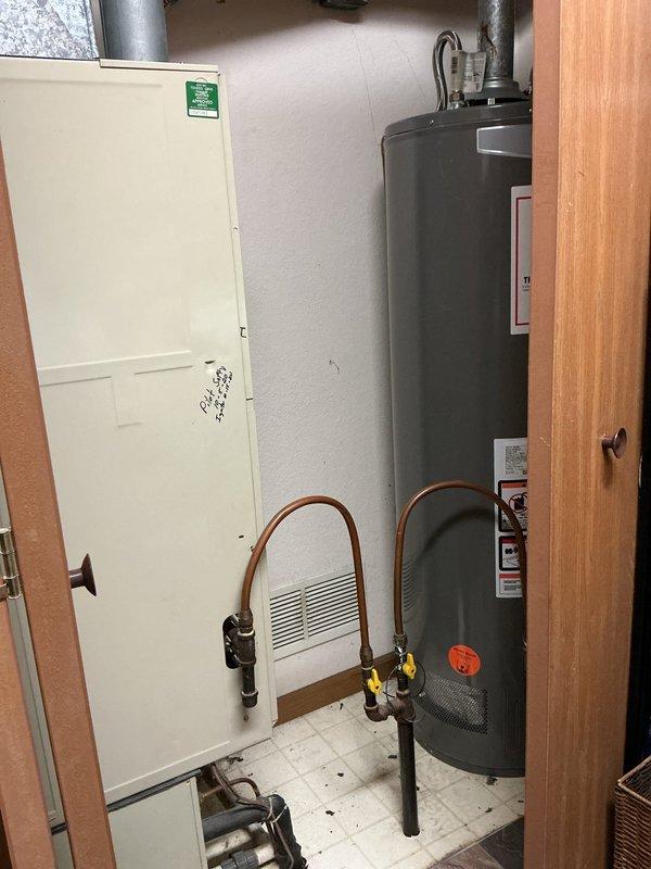 Performed routine furnace tune-up service per customer arrangement (key access provided with landlord approval). Upon inspection, noted water heater installation with signs of corrosion on exhaust vent pipe connections. Heating system was tested, cleaned, and verified for proper operation. No major issues requiring immediate attention were identified.