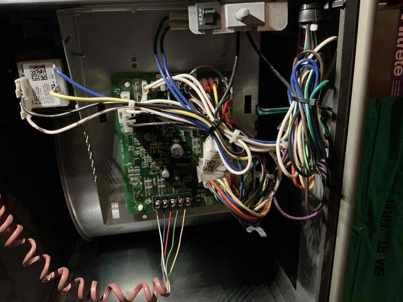 Performed standard furnace tune-up on customer's unit as part of manufacturer warranty maintenance. Inspected control panel wiring connections and circuit board functionality, finding all components in proper working order. Checked furnace installation relative to water heater setup in mechanical room, confirming proper ventilation through existing ductwork and verifying filter condition.