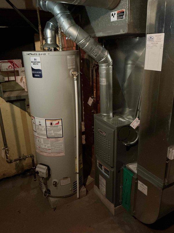 Performed standard furnace tune-up on customer's unit as part of manufacturer warranty maintenance. Inspected control panel wiring connections and circuit board functionality, finding all components in proper working order. Checked furnace installation relative to water heater setup in mechanical room, confirming proper ventilation through existing ductwork and verifying filter condition.