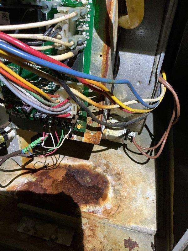 Performed standard furnace maintenance and identified significant rust and corrosion on the heat exchanger and control board area. Documented extensive oxidation damage with photos, indicating possible moisture intrusion or condensate leak affecting electrical components. Recommended system replacement due to safety concerns and potential component failure.