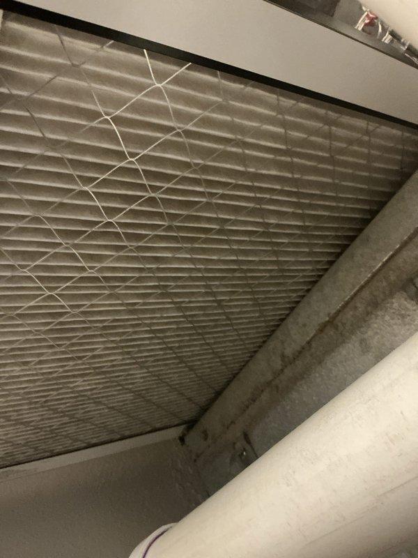 Responded to customer complaint of furnace short-cycling with immediate shutoff and restart. Inspection revealed thermostat communication issues despite customer's recent thermostat replacement. Performed diagnostic testing with temperature probe and examined air filter condition, which showed accumulated dust affecting system efficiency.