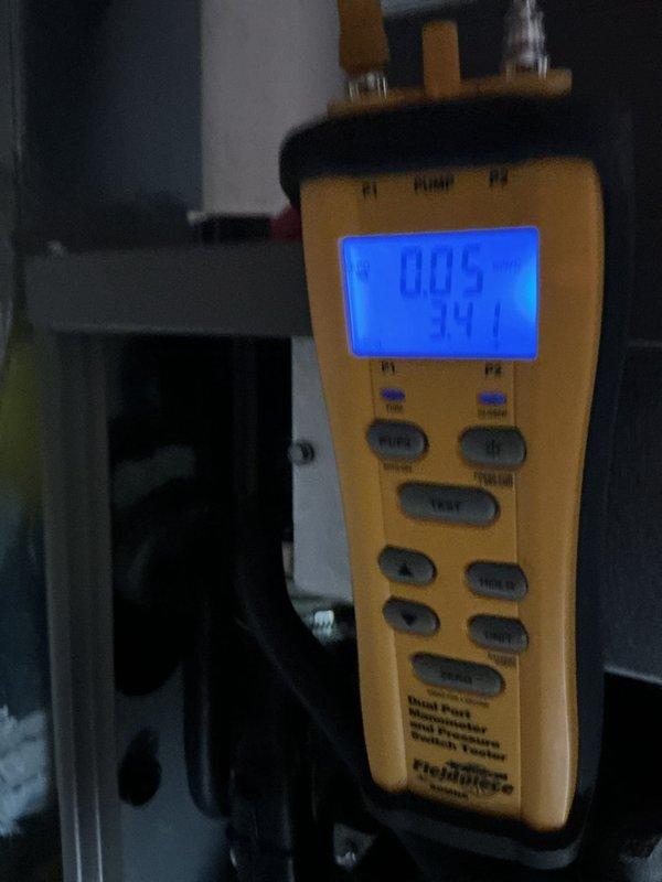 Performed scheduled furnace maintenance service. Conducted electrical diagnostics using Fluke 116 multimeter, measuring voltage readings of 474V. Utilized Fieldpiece dual port manometer to check system pressure differential (0.05) and temperature (241). Customer had expressed dissatisfaction with previous rescheduling issues.