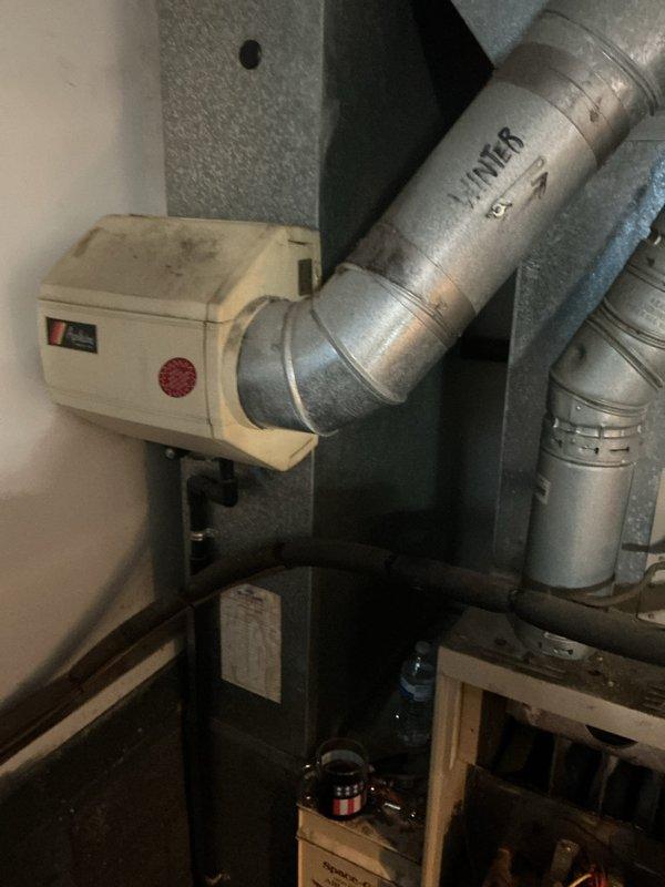 Responded to service call for non-operational furnace in residential property. Inspected 28-year-old WINNER unit with open access panel revealing deteriorated wiring and aging components. Performed diagnostic testing on heat exchanger and control systems, identifying end-of-life failure points consistent with the unit's advanced age. Customer previously had furnace installation services from our company.