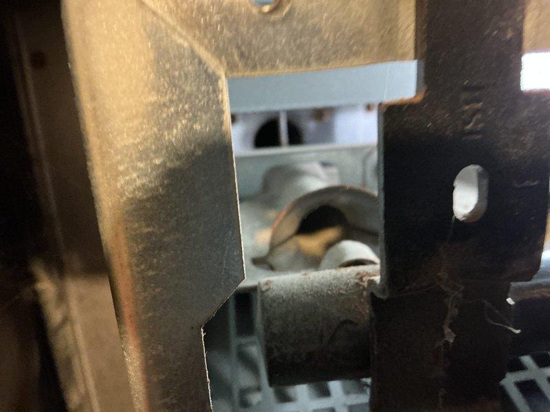 Responded to no heat complaint on aging HVAC system (10+ years old). Inspection revealed significant rust and corrosion at heat exchanger connections with visible deterioration of the metal housing. Replaced failed ignition assembly and corroded gas valve components to restore proper heating function.