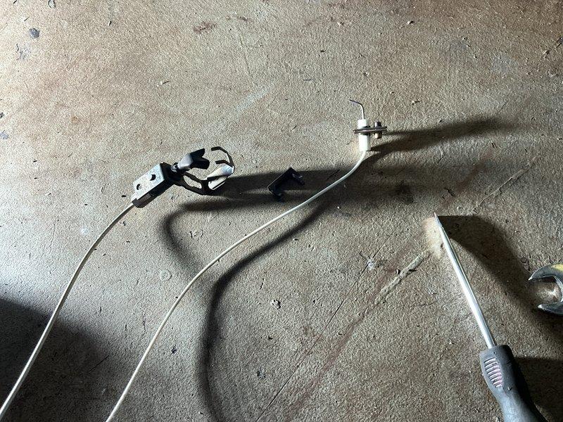 Performed scheduled furnace maintenance tune-up. Inspected pressure gauge readings which showed normal operation. Replaced worn electrical connection bracket and associated wiring components to ensure proper system functionality and prevent potential failure.