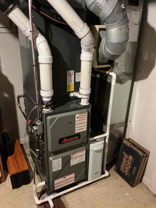 Performed scheduled maintenance service on Amana furnace system. Inspected complete heating assembly including furnace unit, ventilation components, condensate drainage system, and all connected ductwork. All systems operating within normal parameters with no issues identified.