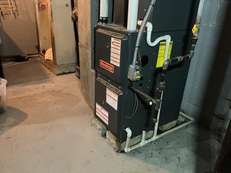 Diagnosed Goodman furnace with no heat complaint. Inspection revealed system was only blowing cold air. Accessed interior components and identified faulty ignition sequence. Repaired connection issue in control board wiring, restored proper heating function, and verified normal operation before completing service.