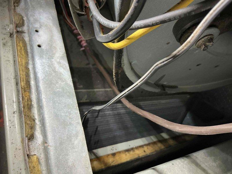 Performed routine maintenance tune-up on 5+ year old furnace. Inspected electrical components and connections, noting minor corrosion on metal framework. Examined Aprilaire control system and verified proper operation of ductwork and electrical panel. Unit is functional but showing expected signs of age-related wear.