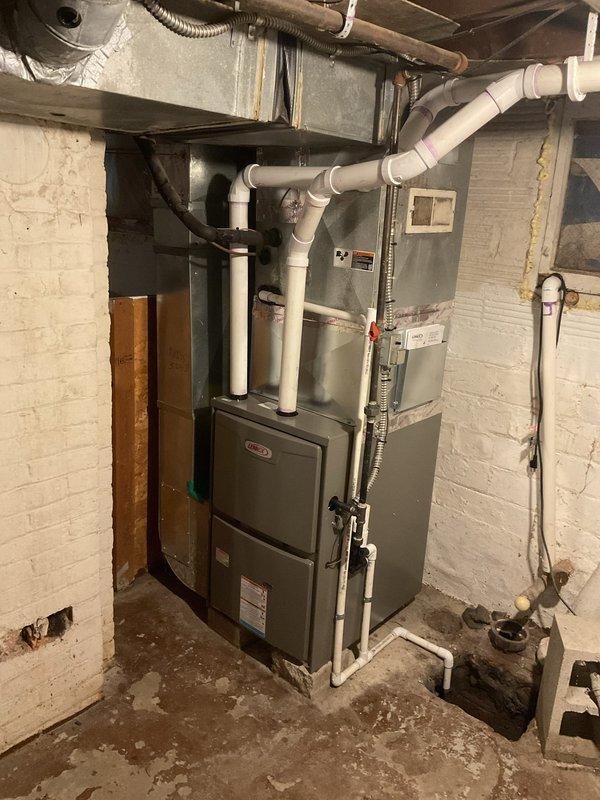 Successfully installed a high-efficiency 96% Lennox up-flow furnace with properly leveled mounting and complete PVC venting system. Installation included setting up a Honeywell T6 WiFi thermostat for enhanced temperature control and remote access capabilities.
