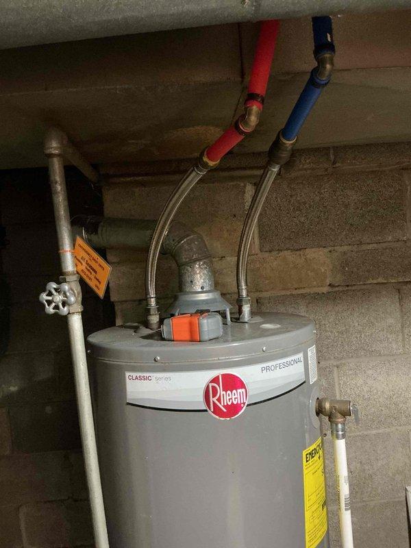 Performed comprehensive furnace tune-up on Rheem Classic Series Professional unit. Inspected blower motor assembly (Revcor), checked all mechanical components, and verified proper operation of the heating system. System is functioning normally with no issues detected.