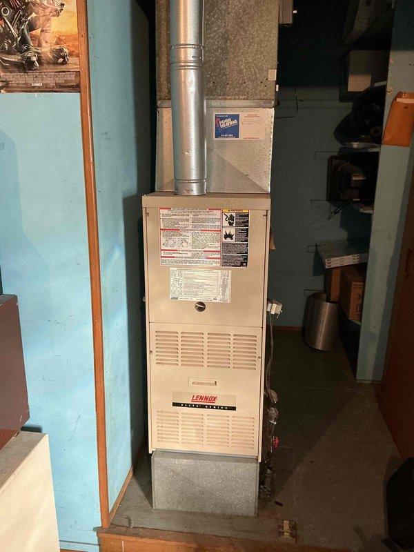 Diagnosed 20-year-old Lennox furnace with intermittent operation, cold air issues, and temperature regulation problems. Performed comprehensive inspection with testing probe, identifying failing flame sensor as root cause. Cleaned and calibrated sensor, restoring proper ignition sequence and system reliability.
