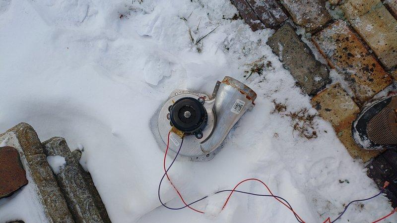 Replaced failed blower motor assembly on customer's outdoor HVAC unit. Sourced replacement parts from Williams supply, installed new motor, and verified proper operation. Unit was serviced under challenging winter conditions with significant snow accumulation around the equipment.