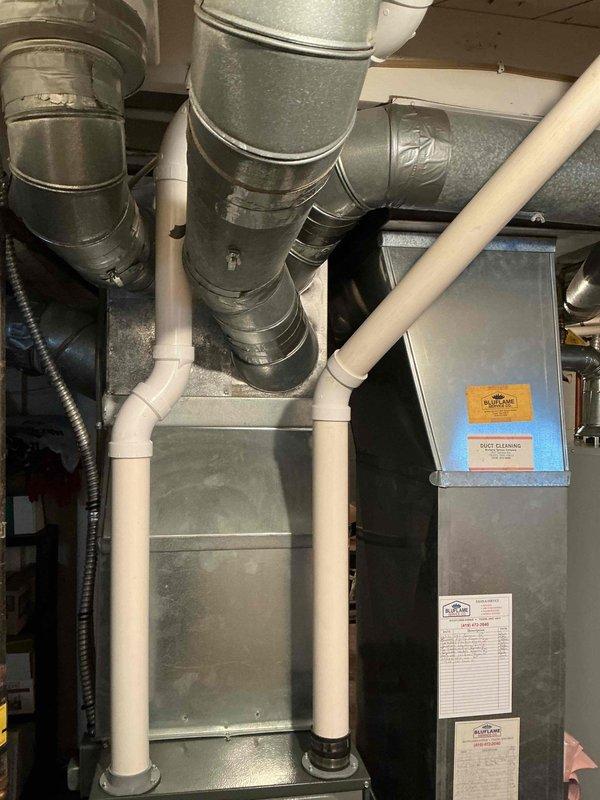 Performed comprehensive furnace tune-up on residential gas furnace system. Inspected ductwork, condensate drain lines, and PVC venting components for proper installation and function. Cleaned and serviced main unit, verifying all safety controls and connections were operating correctly.
