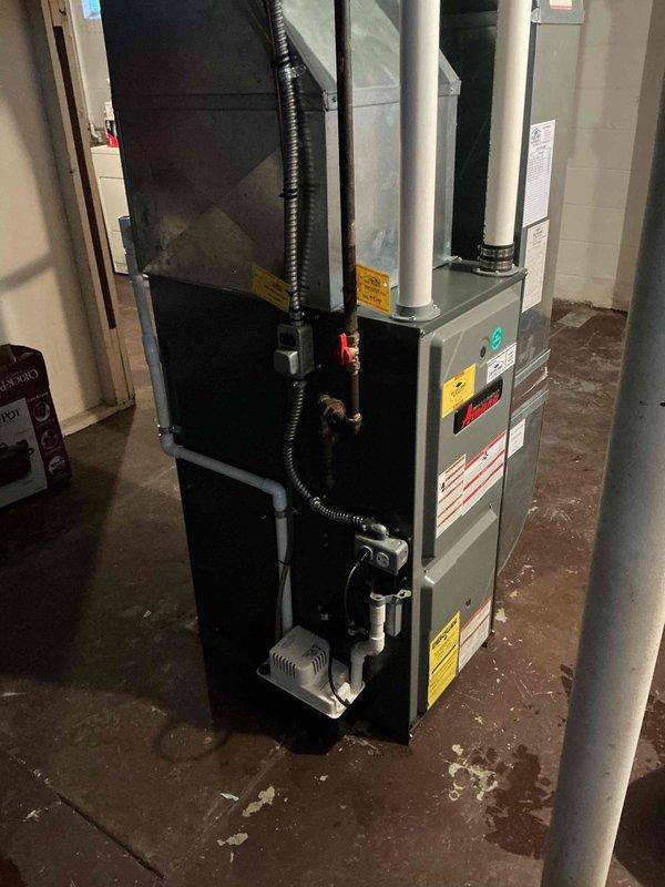 Performed comprehensive furnace tune-up on residential gas furnace system. Inspected ductwork, condensate drain lines, and PVC venting components for proper installation and function. Cleaned and serviced main unit, verifying all safety controls and connections were operating correctly.