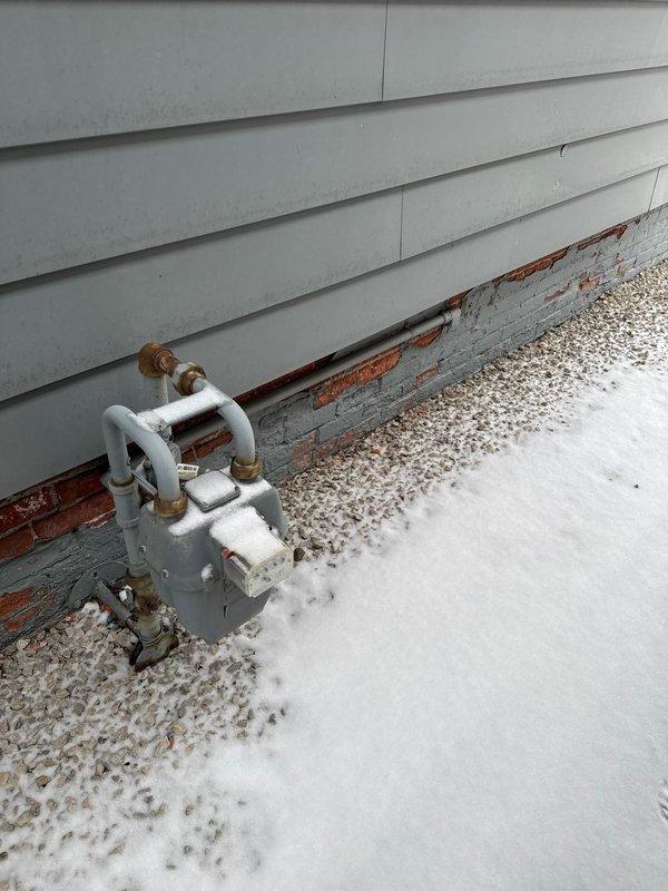 Conducted site evaluation for installation of new furnace and ductwork system. Inspected existing gas meter connection on exterior of building to assess capacity for additional HVAC equipment. Evaluated interior space currently under renovation with exposed framing, which will require coordination of HVAC installation with ongoing construction work.