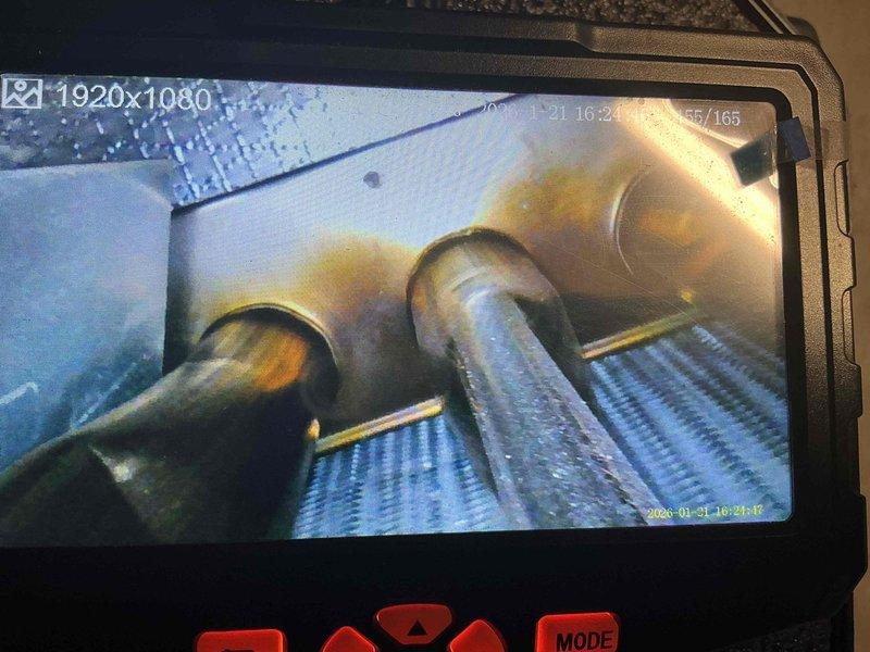 Performed routine heating system maintenance service. Conducted thorough inspection of ductwork and heat exchanger components using diagnostic camera equipment, documenting condition of metal surfaces. Observed some discoloration and possible corrosion on copper piping connections requiring monitoring during next service visit.