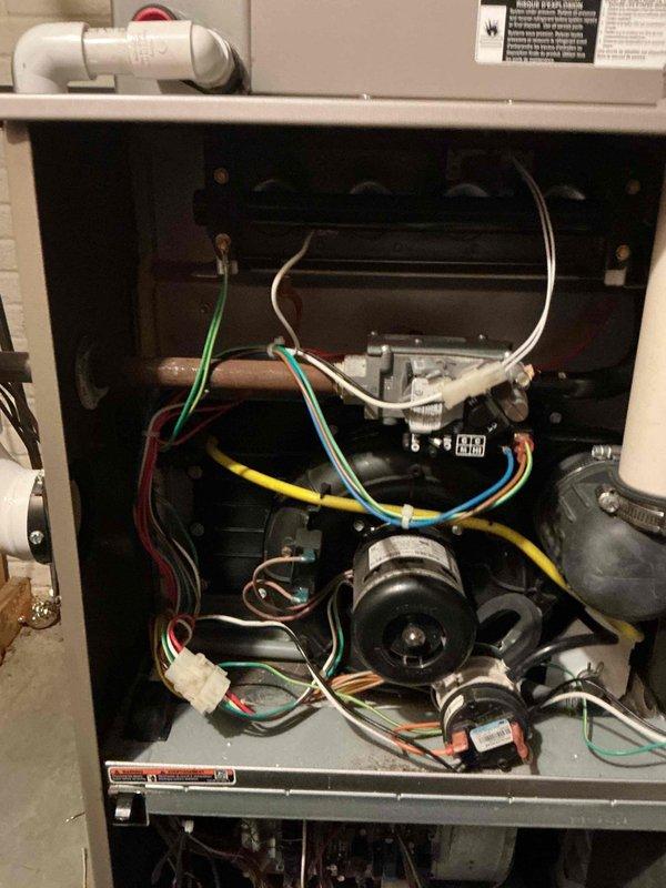 Responded to no heat call, inspected furnace with access panels removed. Performed diagnostic assessment of blower motor, electrical connections, and circuit board. Identified and resolved issue causing heating failure, restoring proper system operation.