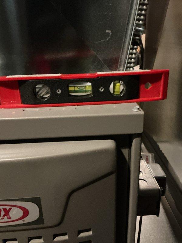 Performed scheduled maintenance on 7-year-old Lennox furnace. Verified proper leveling of equipment using spirit level and inspected all major components. System is functioning correctly with no issues identified.