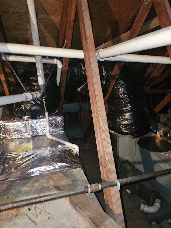 Successfully installed a 96% efficient 70kBtu horizontal furnace in the attic of Building E (Hair Salon). Installation included necessary metal spacer for the coil connection and a Honeywell T6 thermostat, with all ductwork properly insulated and connected according to manufacturer specifications.