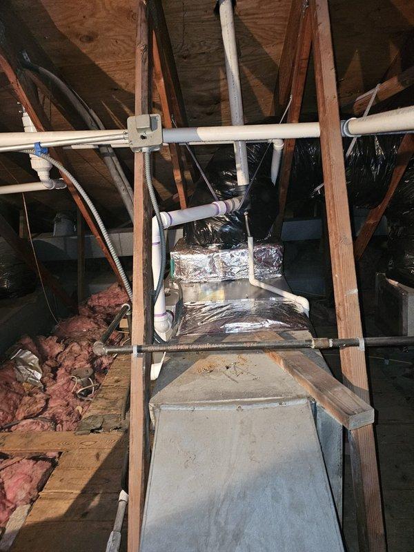 Successfully installed a 96% efficient 70kBtu horizontal furnace in the attic of Building E (Hair Salon). Installation included necessary metal spacer for the coil connection and a Honeywell T6 thermostat, with all ductwork properly insulated and connected according to manufacturer specifications.