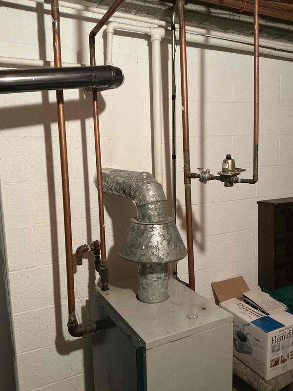 Identified and repaired a leak in the basement boiler system that was affecting the heating unit with galvanized vent piping. Inspected associated copper supply lines, valves, and fittings for proper function and performed necessary service to restore system integrity.
