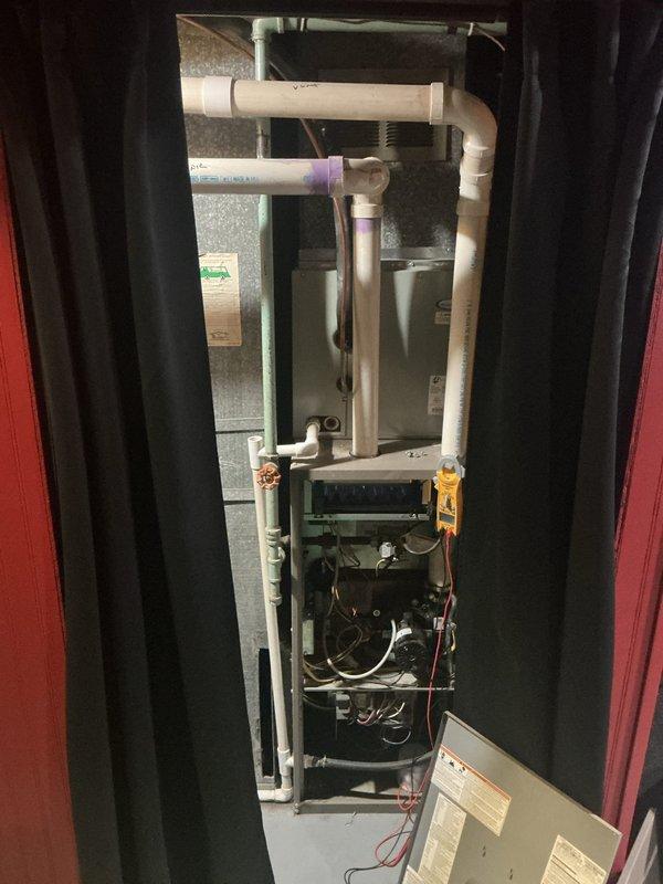 Responded to service call for 15-year-old furnace with no heat complaint. Diagnostic testing revealed pilot ignition failure. Cleaned flame sensor, checked gas valve operation, and verified proper ignition sequence. System now operating correctly with strong flame signal and appropriate temperature rise.