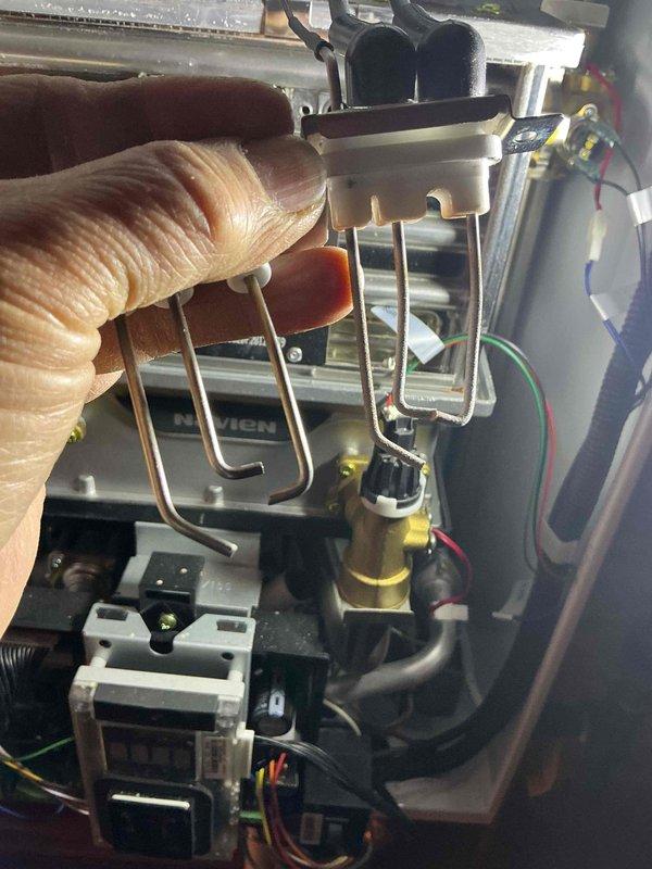 Performed courtesy check on boiler following customer-reported shutdown and reset. Inspected internal components including control valve, electrical connections, and sensor assembly. Confirmed unit is currently operating properly; no issues identified that would cause system failure during cold weather operation.