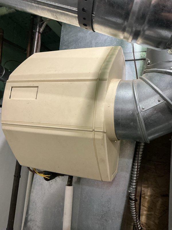 Performed routine maintenance on 4-year-old gas furnace. Inspected blower motor assembly, electrical connections, and wiring integrity. Examined attached humidifier system and verified proper integration with existing ductwork. All components functioning within normal parameters with no issues detected.
