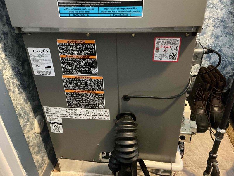 Responded to scheduled heating maintenance service for Lennox HVAC system with R-454B refrigerant. Customer was unaware of appointment; no service performed as customer requested husband call back to reschedule. Visual inspection of furnace unit and PVC venting system was completed during site visit.