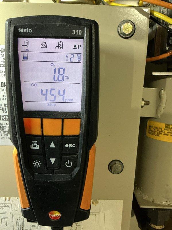Responded to no heat call on natural gas furnace. Inspection revealed significant corrosion on heat exchanger components and combustion analysis with Testo 310 showed dangerous CO readings of 454 ppm with low O₂ levels (1.8%), indicating critical heat exchanger failure. Shut down unit for safety and advised customer replacement is necessary due to carbon monoxide hazard.