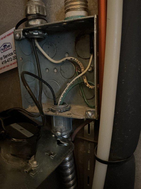 Performed diagnostic service on 13-year-old furnace experiencing ignition issues. Inspected electrical connections at junction box and control board, finding loose wire connections at the main control panel. Secured all connections and verified proper voltage to ignition system. Unit now firing correctly with normal operation confirmed through complete system test cycle.