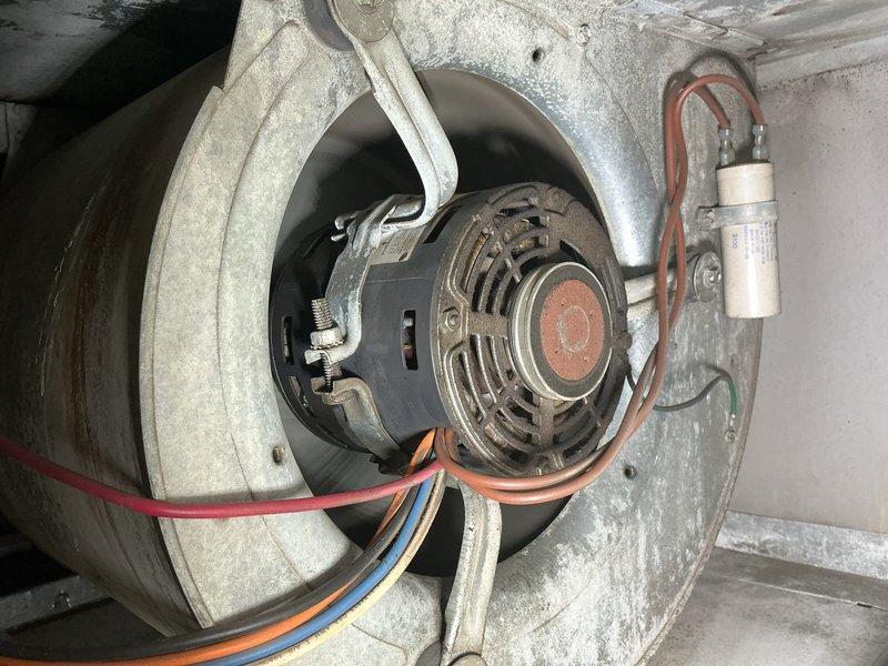 Responded to urgent service call for non-functioning furnace. Upon inspection, found faulty blower motor with significant dust accumulation impacting performance. Replaced motor assembly, cleaned connections on control board, and verified proper electrical connections to restore system operation.