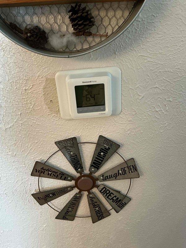 Responded to no heat service call. Diagnosed issue with pilot light ignition. Communicated with customer that gas line appears to be locked. Thermostat was confirmed functioning correctly at 64°F. Left instructions to contact Brian for repair authorization and to notify tenant prior to return visit.