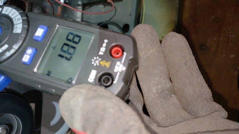 Responded to no-heat call for furnace blowing cold air. Diagnostic inspection revealed failed ignition system preventing flame ignition while blower continued operation. Multimeter testing confirmed faulty flame sensor with 1.00 ohm reading. Replaced flame sensor, cleaned ignition assembly, and verified proper system operation with normal heat output restored.