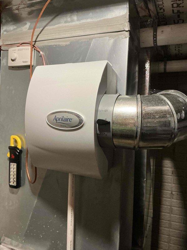 Performed scheduled heating maintenance service on 4-year-old system. Inspected Aprilaire humidifier unit and confirmed proper installation and connections. Examined A.O. Smith Power water heater, completed tank flush service as requested by customer, and verified all plumbing connections and venting were in good working condition.