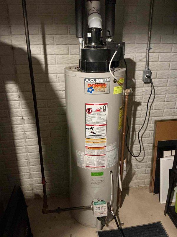 Performed scheduled heating maintenance service on 4-year-old system. Inspected Aprilaire humidifier unit and confirmed proper installation and connections. Examined A.O. Smith Power water heater, completed tank flush service as requested by customer, and verified all plumbing connections and venting were in good working condition.