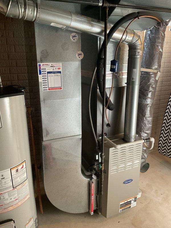 Conducted site visit to finalize commercial HVAC replacement quote, including comprehensive photo documentation and measurements of existing Carrier system with associated ductwork. Documented current installation configuration including furnace unit, metal ductwork network, and connection points to facilitate accurate replacement specifications. Collected 50% deposit for upcoming installation project.