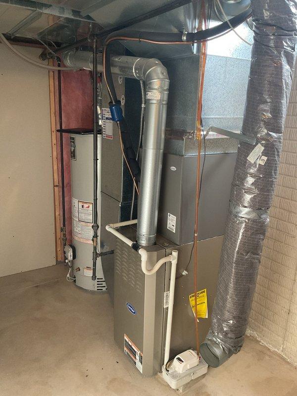 Conducted site visit to finalize commercial HVAC replacement quote, including comprehensive photo documentation and measurements of existing Carrier system with associated ductwork. Documented current installation configuration including furnace unit, metal ductwork network, and connection points to facilitate accurate replacement specifications. Collected 50% deposit for upcoming installation project.