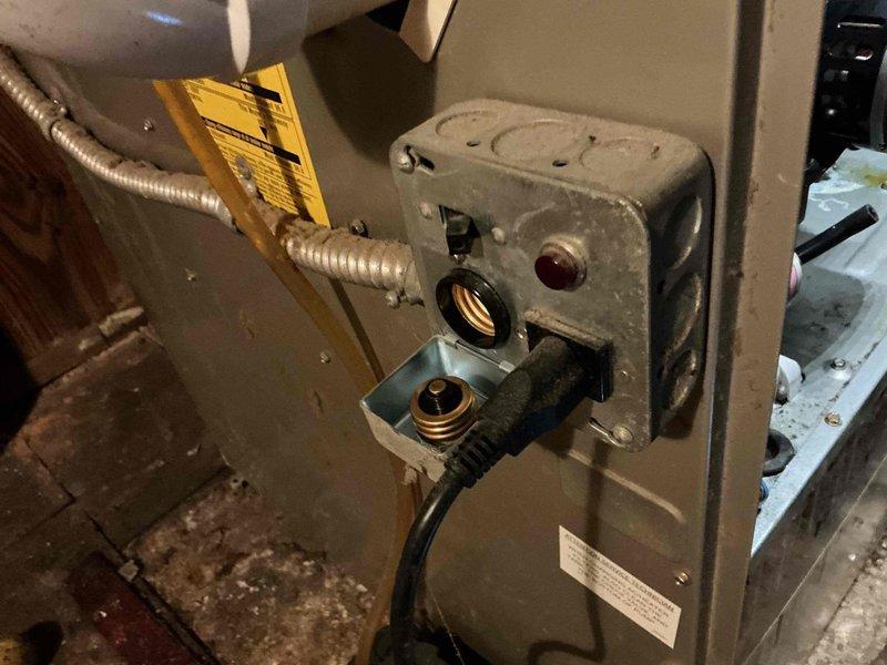 Responded to no heat call for furnace blowing cold air. Diagnosed faulty ignition module indicated by red indicator light. Replaced defective ignition control and verified proper flame ignition sequence. System now operating normally with consistent heat output.