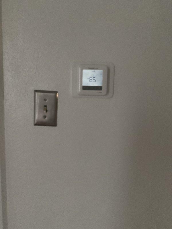 Successfully installed new Lennox 120kbtu floor mount boiler with reused circulation pump and new zone valves. System was properly connected to existing copper piping network and includes an Amtrol expansion tank. Verified proper operation with thermostat set at 65°F.