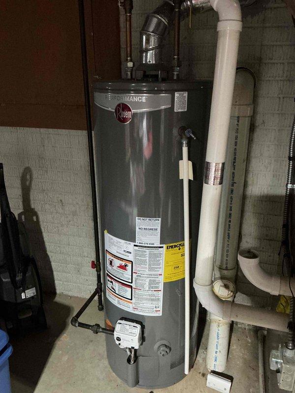 Performed annual maintenance on 15+ year old furnace. Inspected and tested electrical connections, ensuring proper wire connections with appropriate wire nuts. Examined water heater (Rheem Performance model) and verified proper venting through the exhaust system. All components functioning normally with no immediate concerns identified.