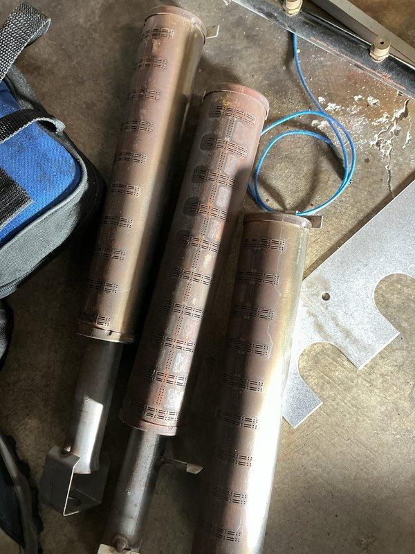 Performed scheduled maintenance on 20-year-old boiler system. Inspected and cleaned copper components including filters/tubing and examined pressure regulator assembly. System operational after service with no major issues detected.