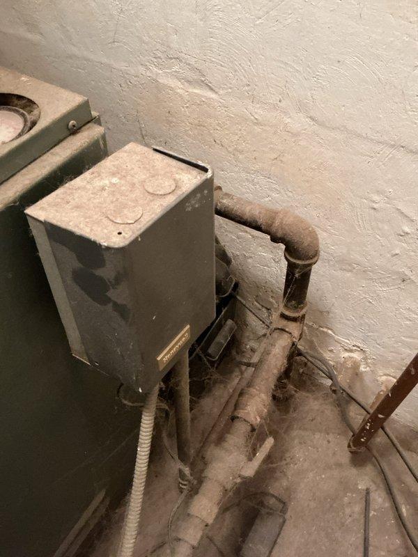 Diagnosed 20+ year old Pennco boiler system with insufficient heat delivery to baseboard radiators despite audible water flow. Inspection revealed aging copper pipes with significant scale buildup and a deteriorated circulation pump. Cleaned primary heat exchanger, replaced circulation pump, and flushed system to remove sediment. System now producing adequate heat throughout all zones.