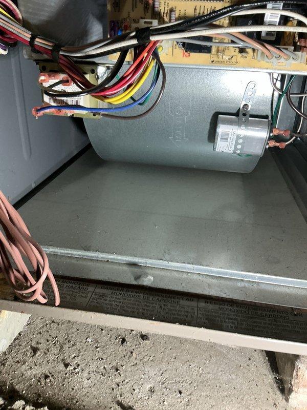Performed routine maintenance on a 3-year-old gas furnace. Inspected electrical connections and wiring in the control compartment, confirming proper installation and condition. Verified thermostat functionality on the Honeywell Home digital unit, which is currently set to "Heat" mode with permanent hold at 72°F. Provided customer with replacement thermostat quote as requested.